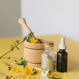 Wooden Mortar and Pestle Used in Extracting Medicinal Flowers